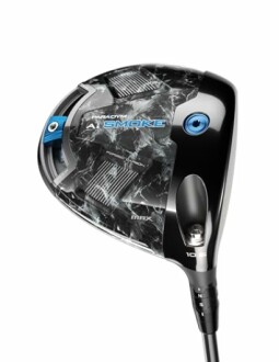 Golf club driver head with sleek design and carbon fiber pattern.