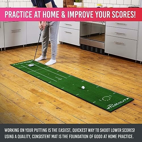 Person practicing golf putting on a green mat in a kitchen.